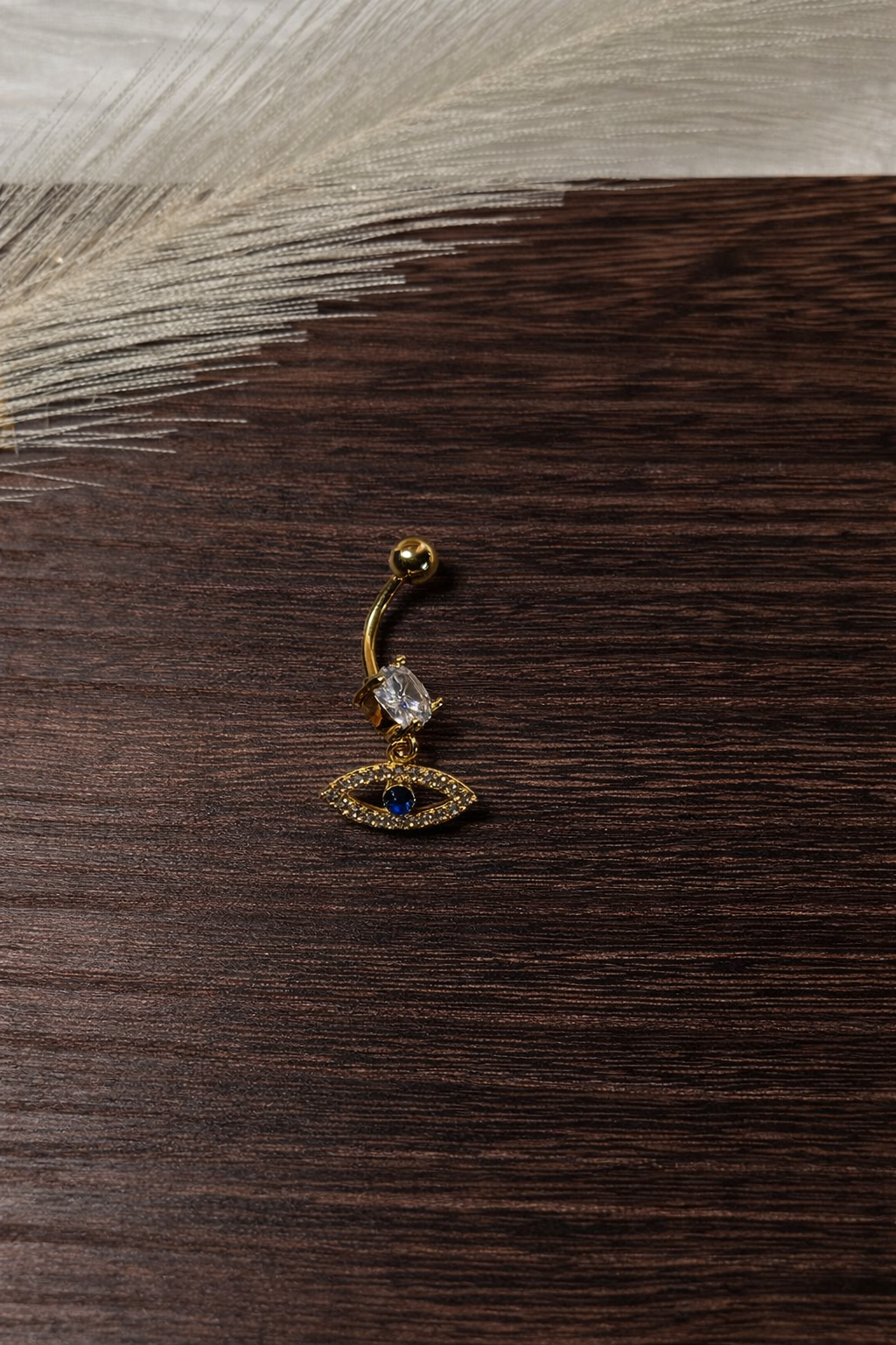 Evil Eye Bauchnabelpiercing